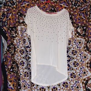 White asymmetrical short sleeve shirt.